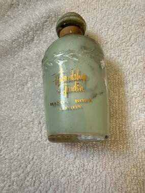 SHULTON FRIENDSHIP GARDEN HAND & BODY LOTION 2 OZ BOTTLE USED